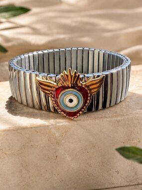 Silver Stretch Bracelet with Fish and Gold Red Evil Eye Accent